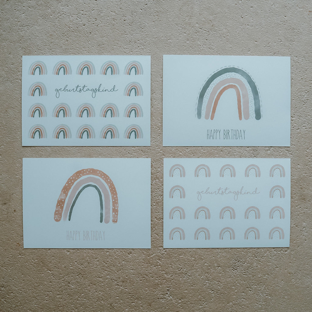 4 Regenbogenkarten, Karten Set auf einem Boden liegend