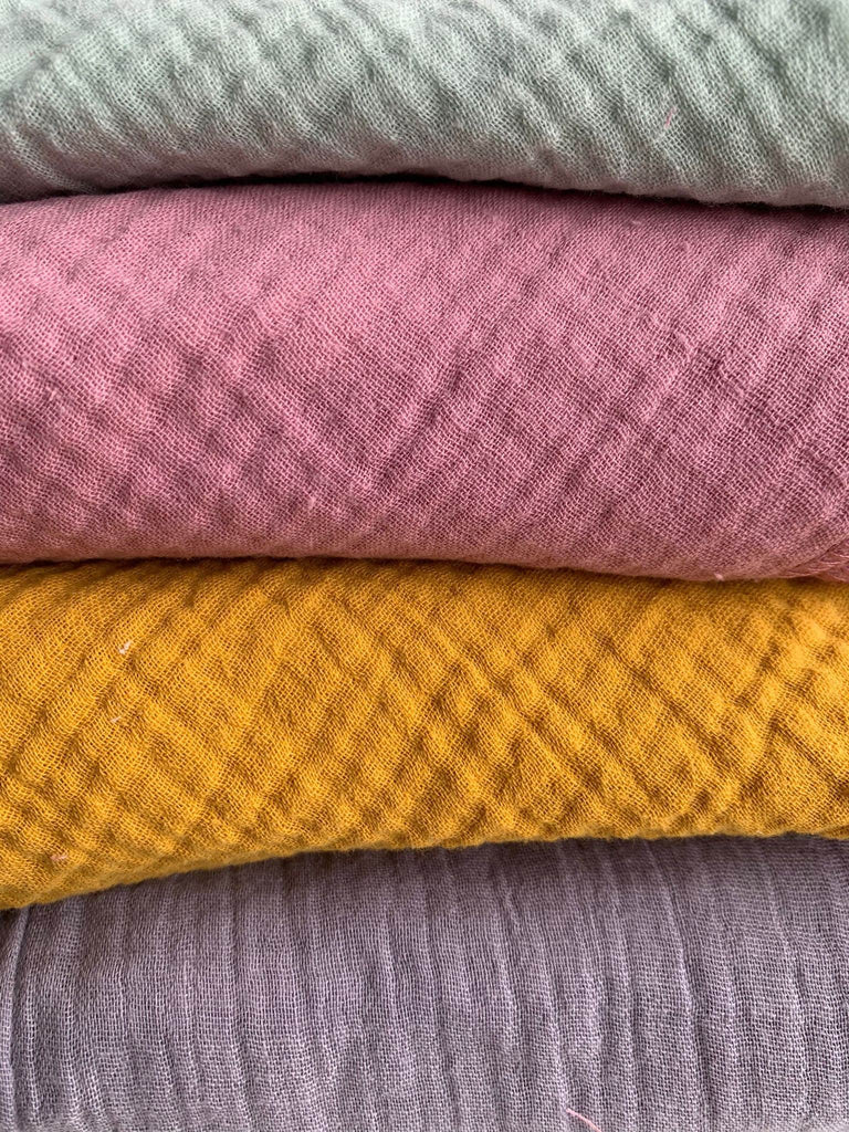 Vier Tücher in verschiedenen Farben